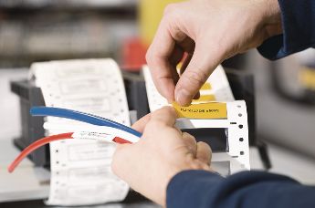 Rail-approved heat shrink labels with low fire risk